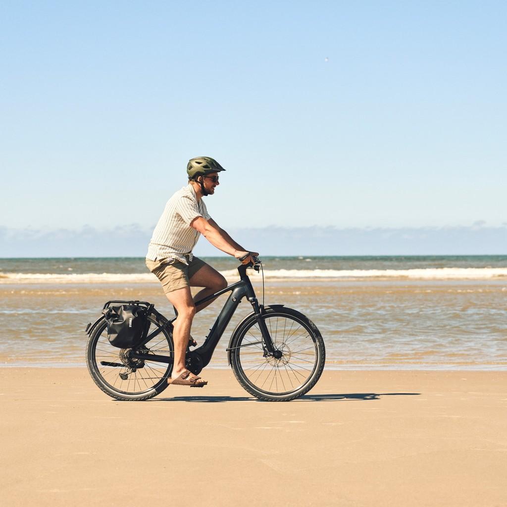 Erleben Sie das Abenteuer mit dem Giant E-Bike, perfekt für entspannte Fahrten am Strand. Freiheit und Komfort auf