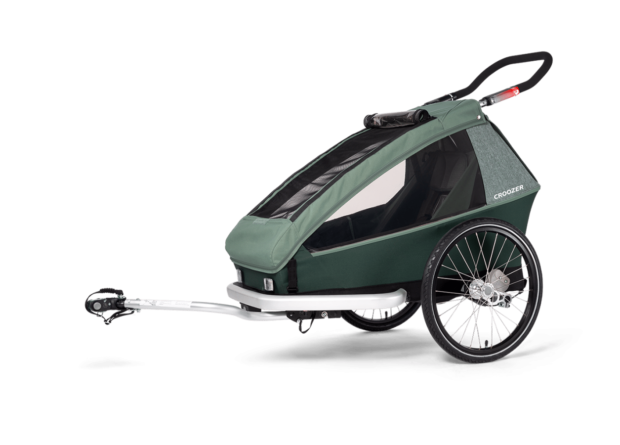 Der Croozer Kid Vaaya 1 ist ein robuster Fahrradanhänger in Grün, ideal für den sicheren Kindertransport.