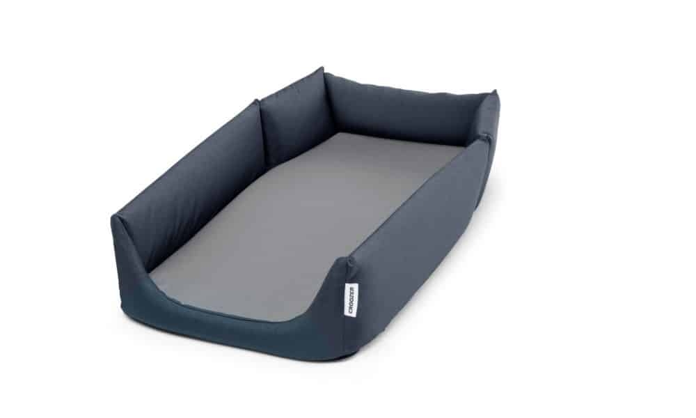 Bequemes Hundebett von Croozer für Fahrradanhänger, ideal für den komfortablen Transport Ihres Vierbeiners.